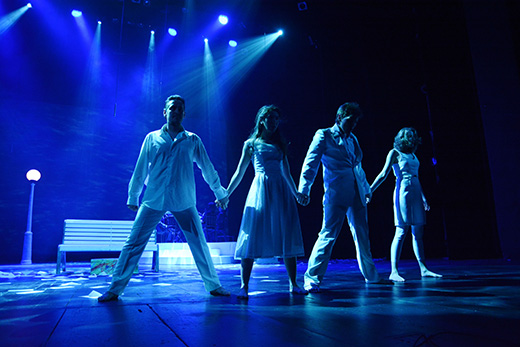 Students performing on stage